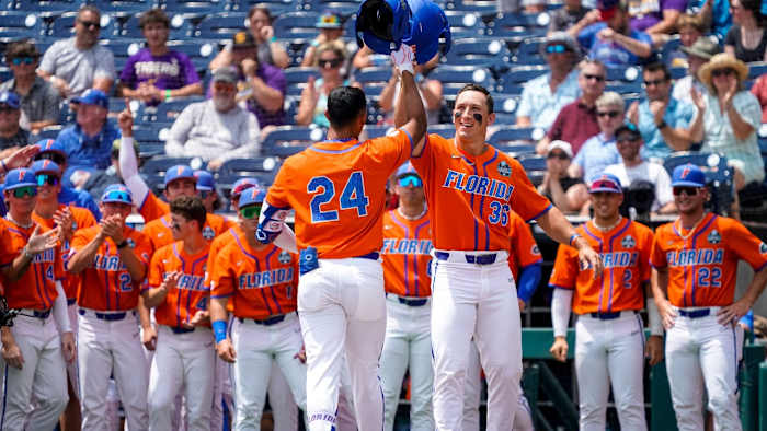 Florida Gators baseball shortstop Josh Rivera (24) and center fielder Wyatt Langford (36)